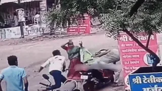 Elderly Mother Attacks Her Son’s Attackers With Stone; Internet Hails Woman’s Bravery | Viral Video